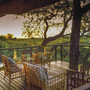 Kaza Safari Lodge, Aussen, Terrasse, Bäume, Sonnenuntergang, Stühle, Holz
